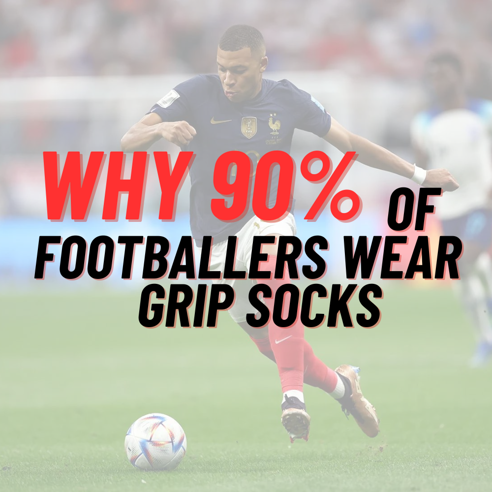 Pro footballer player running with the football ball near his feel while wearing best grip socks