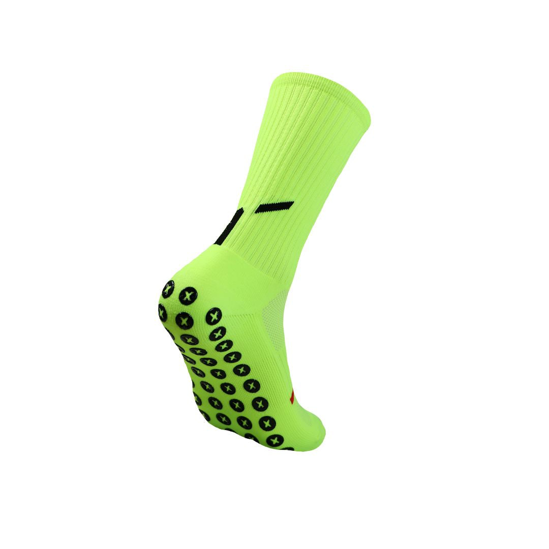 Bright green sock with black pattern on a white background