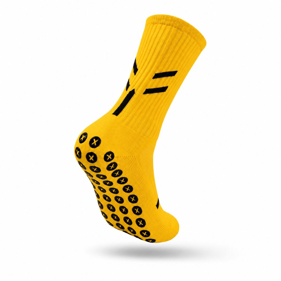 Shop yellow non-slip grip socks with XCORE Grip™ pads for traction, comfort and control in football, rugby, netball and gym training across NZ & Australia.
